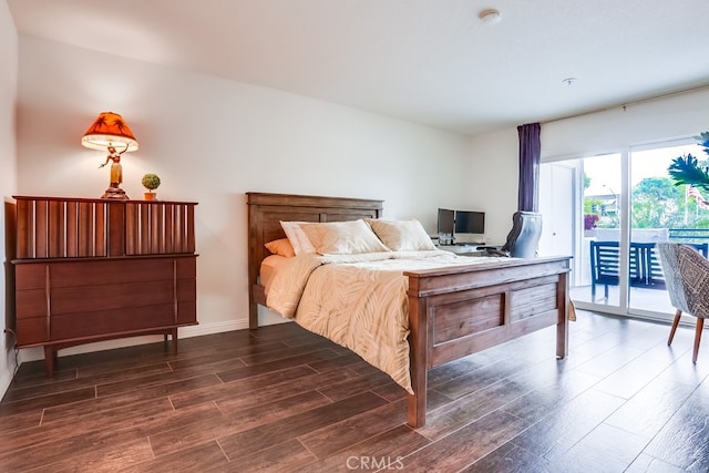 240 Nice Ln Unit 114, Newport Beach, CA 92663 - bedroom with access to outside and wood finished floors