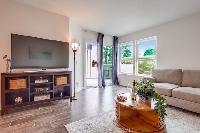 240 Nice Ln Unit 114, Newport Beach, CA 92663 - living area with wood finished floors