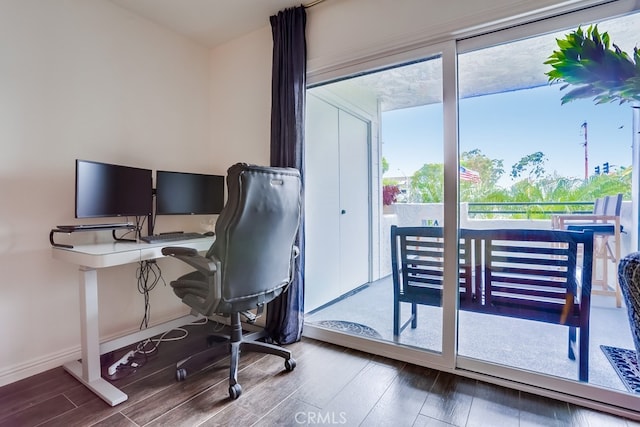 240 Nice Ln Unit 114, Newport Beach, CA 92663 - home office with wood finished floors and healthy amount of natural light