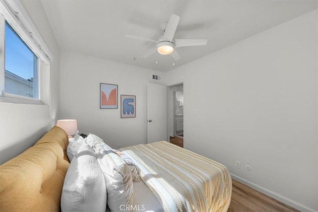 14508 Burin Ave, Lawndale, CA 90260 - bedroom with wood finished floors and ceiling fan