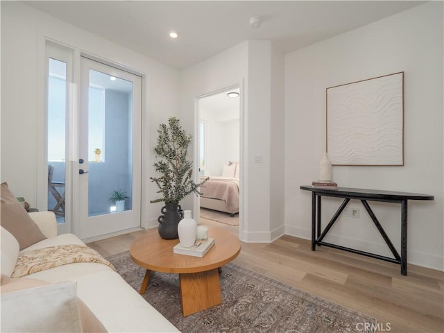 402 W Grand Ave Unit 101, Grover Beach, CA 93433 - living room featuring light wood finished floors and recessed lighting