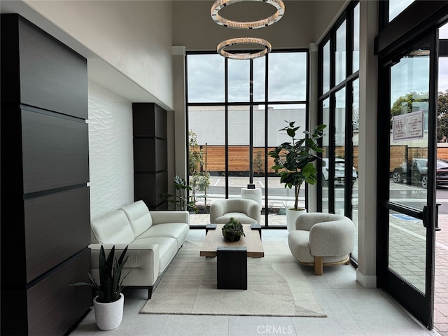 402 W Grand Ave Unit 101, Grover Beach, CA 93433 - building lobby featuring a wall of windows and a high ceiling