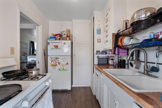 1185 Elm Ave, Chula Vista, CA 91911 - kitchen featuring white appliances, white cabinetry, dark wood-style floors, and light countertops