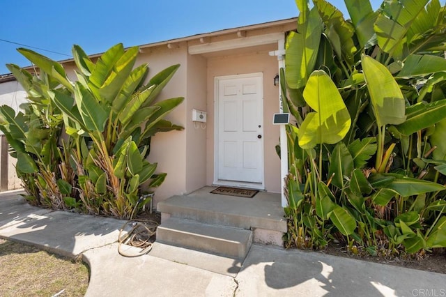 1185 Elm Ave, Chula Vista, CA 91911 - doorway to property featuring stucco siding