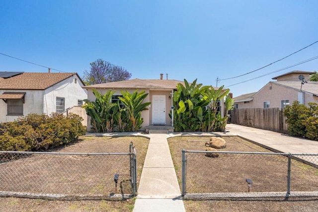 1185 Elm Ave, Chula Vista, CA 91911 - view of front of house featuring a fenced front yard and stucco siding