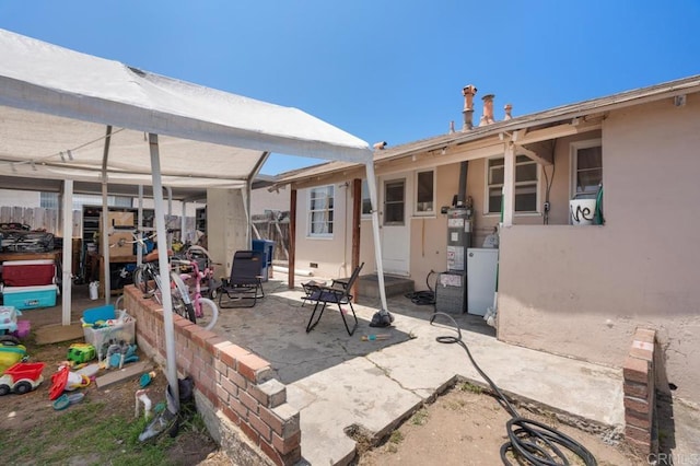 1185 Elm Ave, Chula Vista, CA 91911 - view of patio featuring strapped water heater
