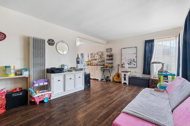 1185 Elm Ave, Chula Vista, CA 91911 - living room featuring a heating unit and dark wood-style floors