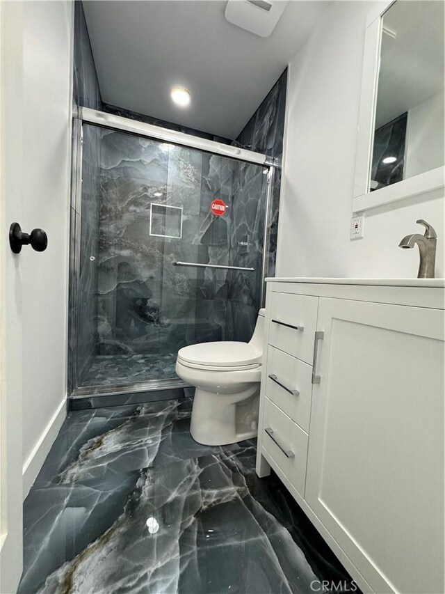 5230 Seville Ave, Encino, CA 91436 - bathroom featuring marble tiled flooring, vanity, a marble finish shower, and recessed lighting