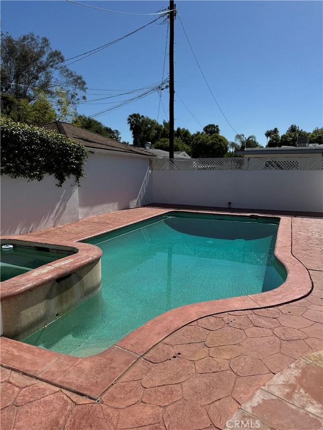5230 Seville Ave, Encino, CA 91436 - view of swimming pool featuring a fenced backyard, a patio, and a pool with connected hot tub