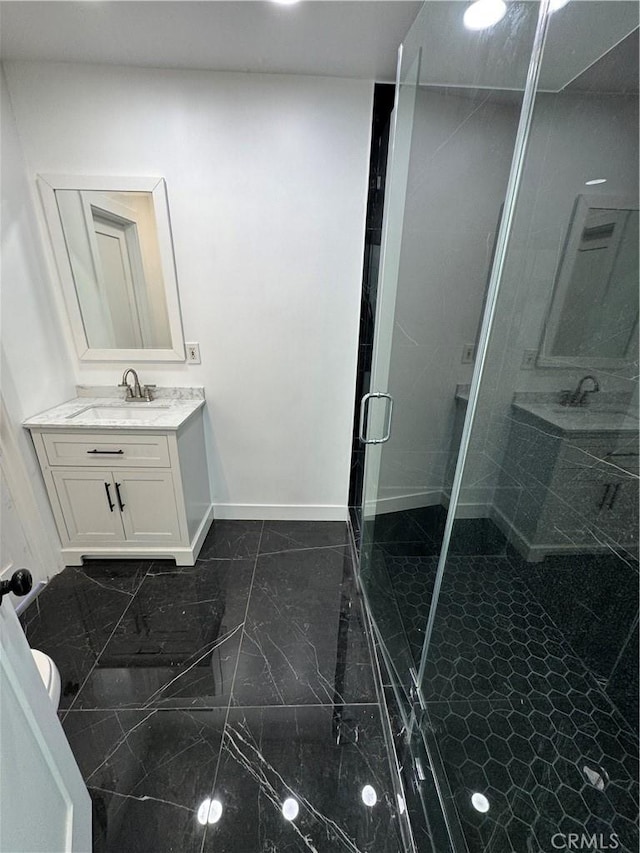 5230 Seville Ave, Encino, CA 91436 - full bath with vanity, a stall shower, and marble finish flooring