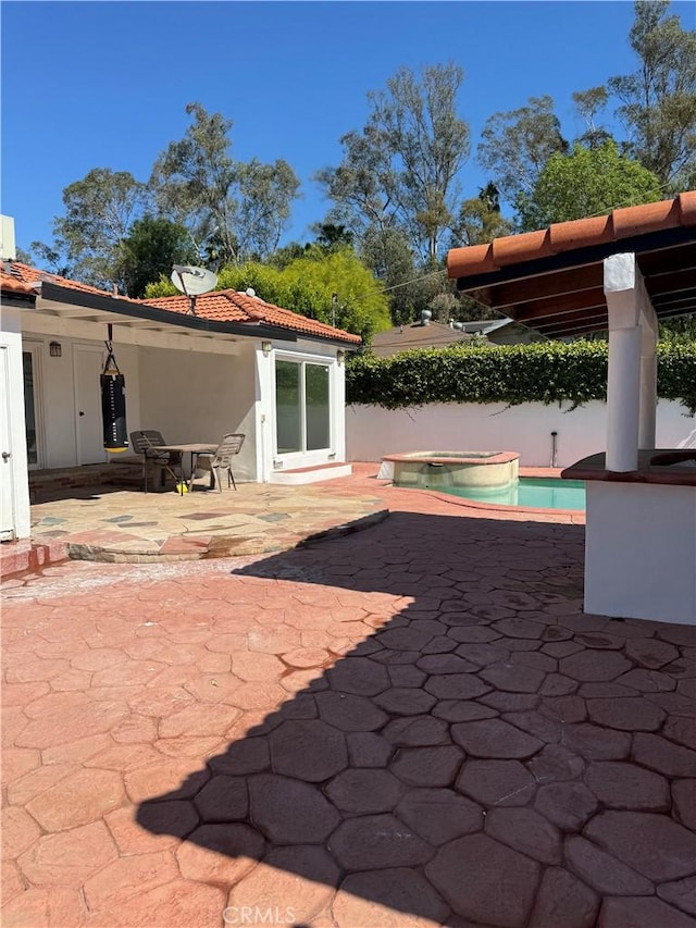 5230 Seville Ave, Encino, CA 91436 - view of patio with a jacuzzi