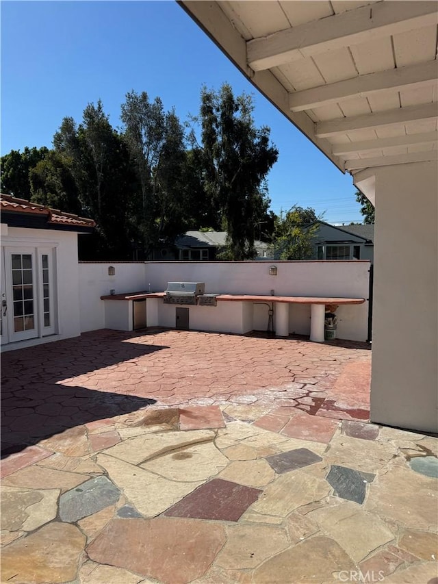 5230 Seville Ave, Encino, CA 91436 - view of patio with an outdoor kitchen and french doors