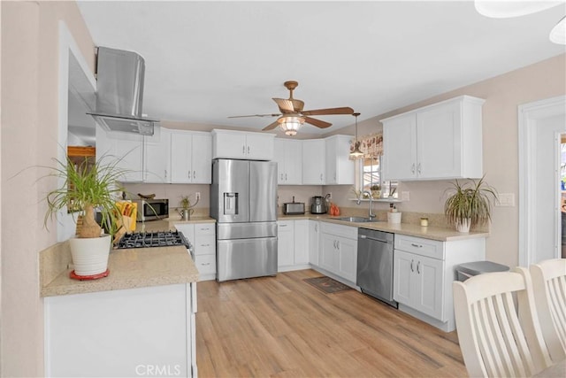 23609 Canyon Lake Dr N, Canyon Lake, CA 92587 - kitchen featuring stainless steel appliances, a ceiling fan, white cabinets, and light wood finished floors