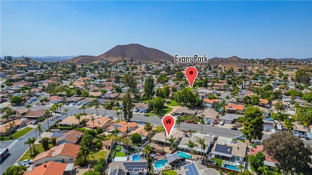 23609 Canyon Lake Dr N, Canyon Lake, CA 92587 - aerial view of property's location with a mountainous background and nearby suburban area