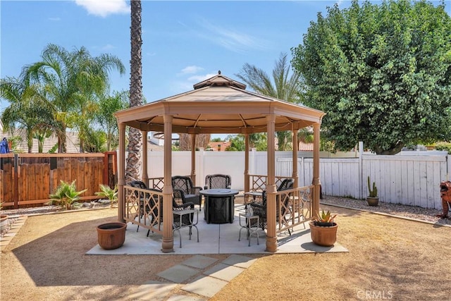 23609 Canyon Lake Dr N, Canyon Lake, CA 92587 - fenced backyard with a gazebo, a fire pit, and a patio