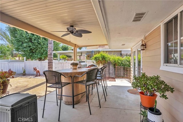 23609 Canyon Lake Dr N, Canyon Lake, CA 92587 - fenced backyard featuring ceiling fan and a patio area