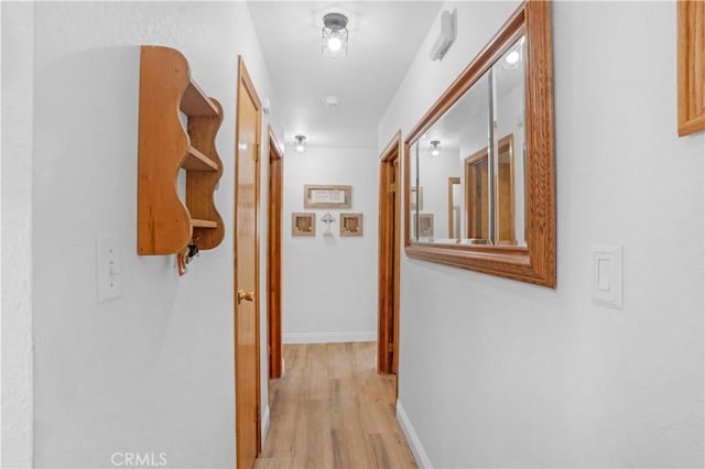 23609 Canyon Lake Dr N, Canyon Lake, CA 92587 - hallway featuring light wood finished floors and baseboards