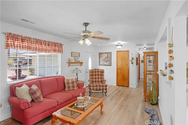 23609 Canyon Lake Dr N, Canyon Lake, CA 92587 - living area with a ceiling fan and light wood-type flooring