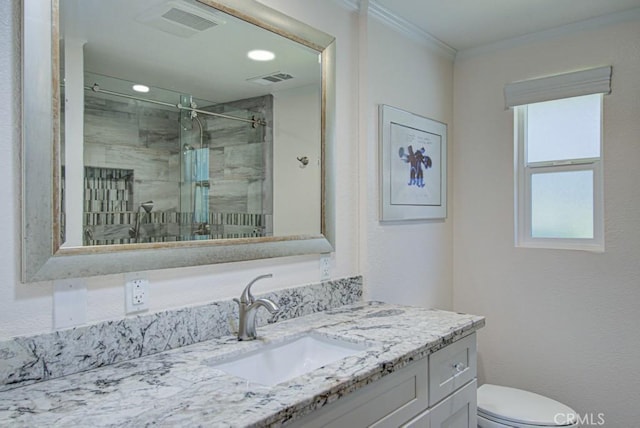 701 Avenida Sevilla Unit C, Laguna Woods, CA 92637 - bathroom featuring a shower stall, vanity, and ornamental molding