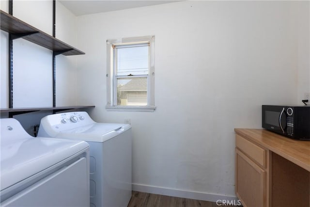 15508 Elmcroft Ave, Norwalk, CA 90650 - laundry area featuring separate washer and dryer and wood finished floors
