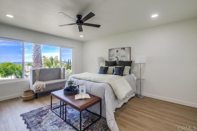 2451 Helix St, Spring Valley, CA 91977 - bedroom with multiple windows, light wood-type flooring, recessed lighting, and a ceiling fan