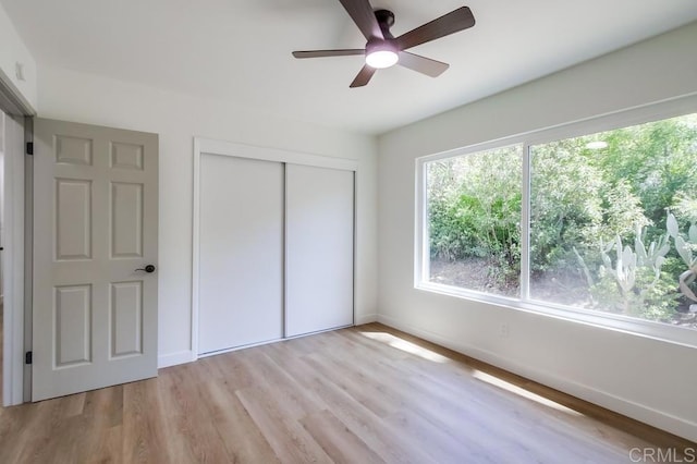 2451 Helix St, Spring Valley, CA 91977 - unfurnished bedroom featuring a closet, light wood-type flooring, and ceiling fan