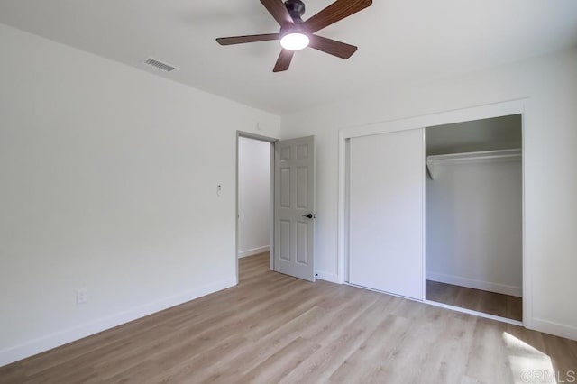 2451 Helix St, Spring Valley, CA 91977 - unfurnished bedroom with wood finished floors, a closet, and a ceiling fan