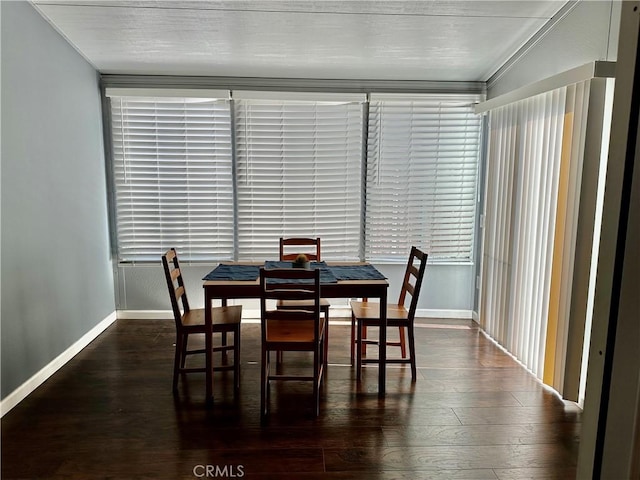 983 Orchard Ln, Colton, CA 92324 - dining area featuring dark wood-type flooring and healthy amount of natural light