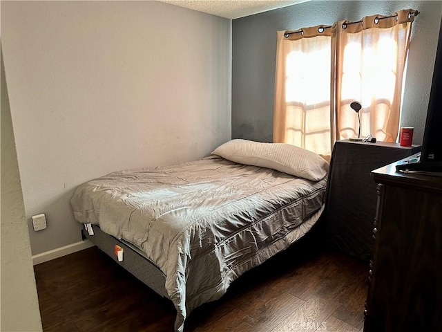 983 Orchard Ln, Colton, CA 92324 - bedroom featuring wood finished floors and a textured ceiling
