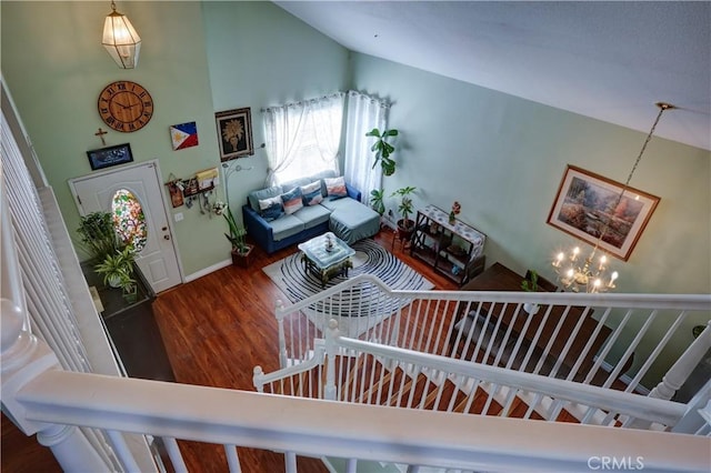 1808 Cave St, Redlands, CA 92374 - living area with a chandelier, wood finished floors, and high vaulted ceiling