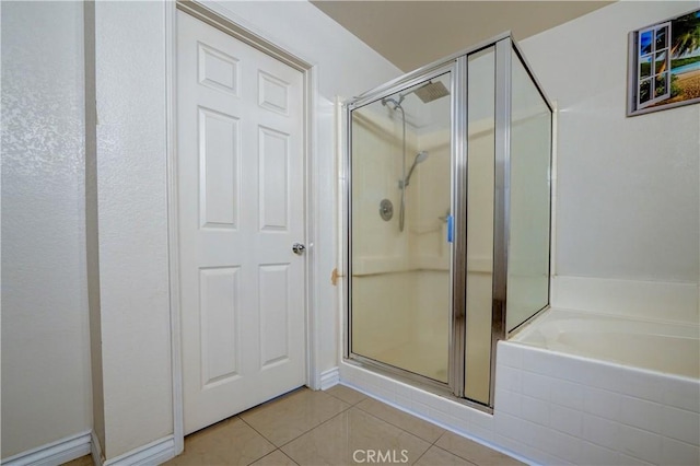 1808 Cave St, Redlands, CA 92374 - bathroom featuring tile patterned floors, a shower stall, and a garden tub