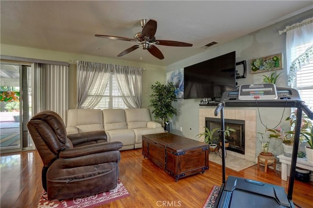 1808 Cave St, Redlands, CA 92374 - living area with wood finished floors, ceiling fan, and a fireplace