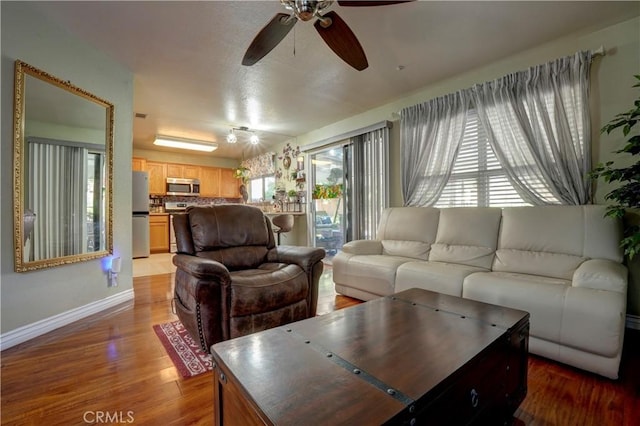 1808 Cave St, Redlands, CA 92374 - living room with ceiling fan and wood finished floors