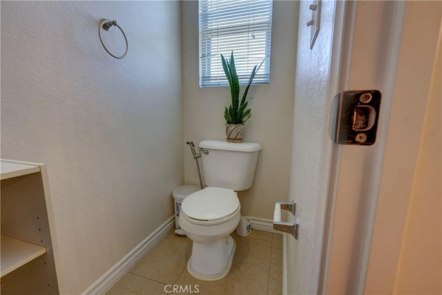 1808 Cave St, Redlands, CA 92374 - bathroom featuring toilet and tile patterned flooring