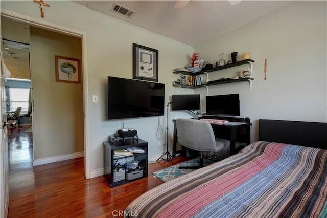 1808 Cave St, Redlands, CA 92374 - bedroom with wood finished floors, a desk, and a ceiling fan