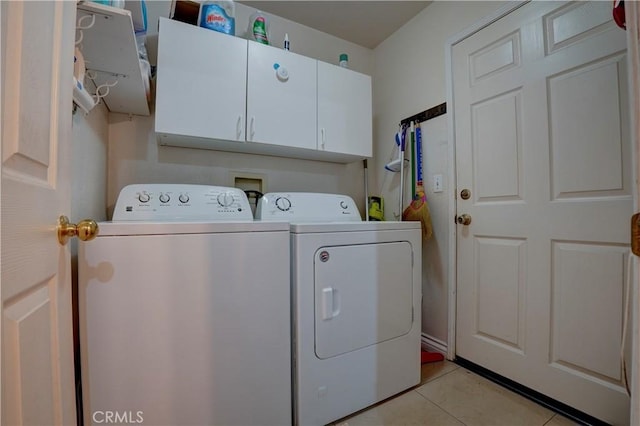 1808 Cave St, Redlands, CA 92374 - laundry room featuring cabinet space, washer and clothes dryer, and light tile patterned floors