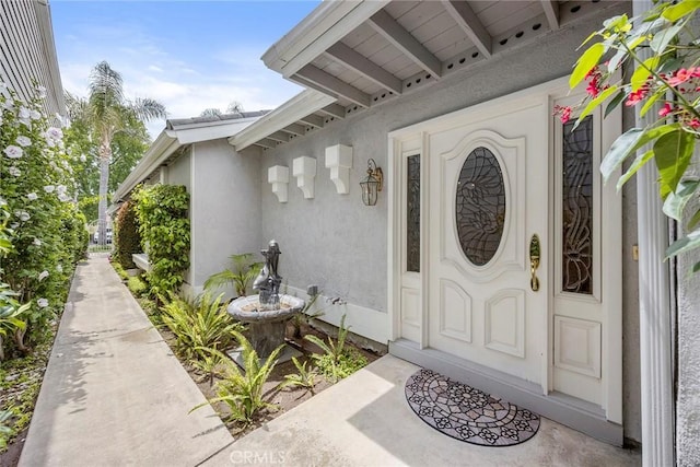 21971 Cayuga Ln N, Lake Forest, CA 92630 - view of exterior entry featuring stucco siding