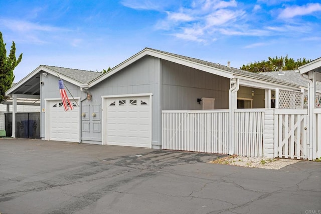 4265 Spoon Bill Way, Oceanside, CA 92057 - view of property exterior with a garage and roof with shingles