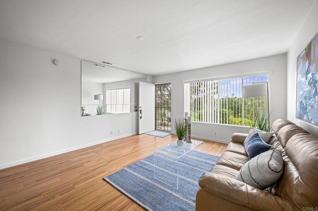 4265 Spoon Bill Way, Oceanside, CA 92057 - living room featuring wood finished floors and baseboards
