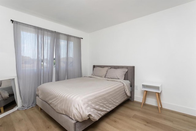 4576 Mariners Bay, Oceanside, CA 92057 - bedroom with light wood-type flooring and baseboards