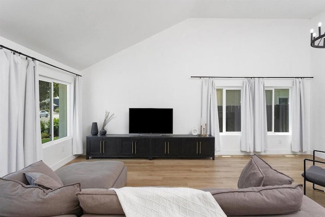 4576 Mariners Bay, Oceanside, CA 92057 - living area featuring vaulted ceiling and light wood-type flooring
