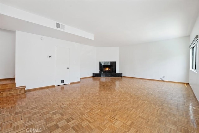 13012 Valleyheart Dr Unit 8, Studio City, CA 91604 - unfurnished living room featuring baseboards and a fireplace