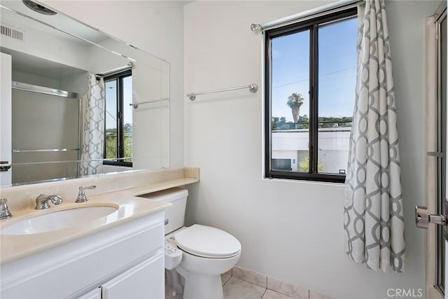 13012 Valleyheart Dr Unit 8, Studio City, CA 91604 - bathroom with a shower with door, vanity, and tile patterned flooring