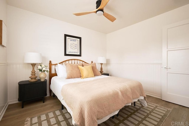 1713 Stewart St, Oceanside, CA 92054 - bedroom with a wainscoted wall, wood finished floors, and ceiling fan