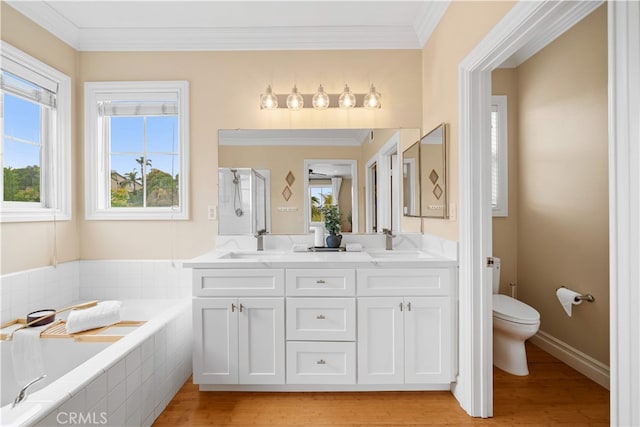 2 Corte Arbertura, San Clemente, CA 92673 - bathroom featuring double vanity, a garden tub, crown molding, wood finished floors, and an enclosed shower