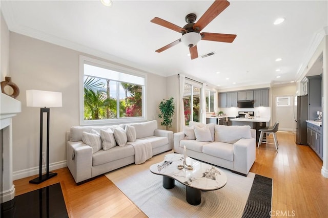 2 Corte Arbertura, San Clemente, CA 92673 - living area featuring ornamental molding, recessed lighting, a ceiling fan, and light wood-style flooring