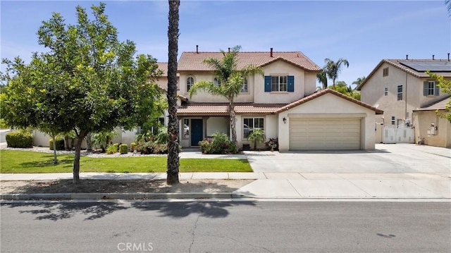 17733 Willow Dr, Riverside, CA 92503 - view of front of house featuring stucco siding, a tiled roof, an attached garage, driveway, and a front lawn