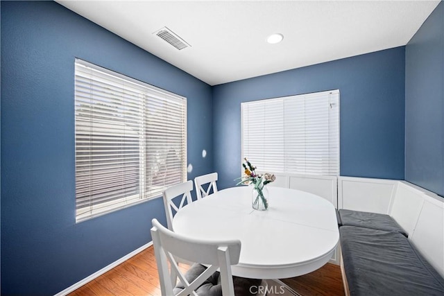 17733 Willow Dr, Riverside, CA 92503 - dining space featuring wood finished floors, plenty of natural light, and recessed lighting