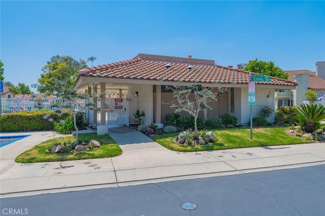 1229 Porto Grande Unit 4, Diamond Bar, CA 91765 - mediterranean / spanish house with a tile roof, stucco siding, and a gate