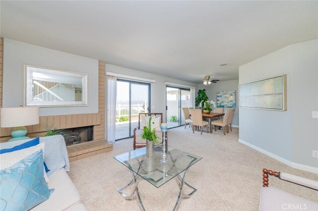 1229 Porto Grande Unit 4, Diamond Bar, CA 91765 - carpeted living room with a fireplace and ceiling fan